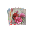 Punga cadou, 26x32x9.5cm, manere din sfoara, diverse imagini cu flori